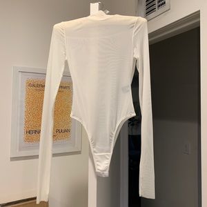 Danielle Guzio white mesh bodysuit